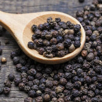 Black_pepper_whole_peppercorn_1